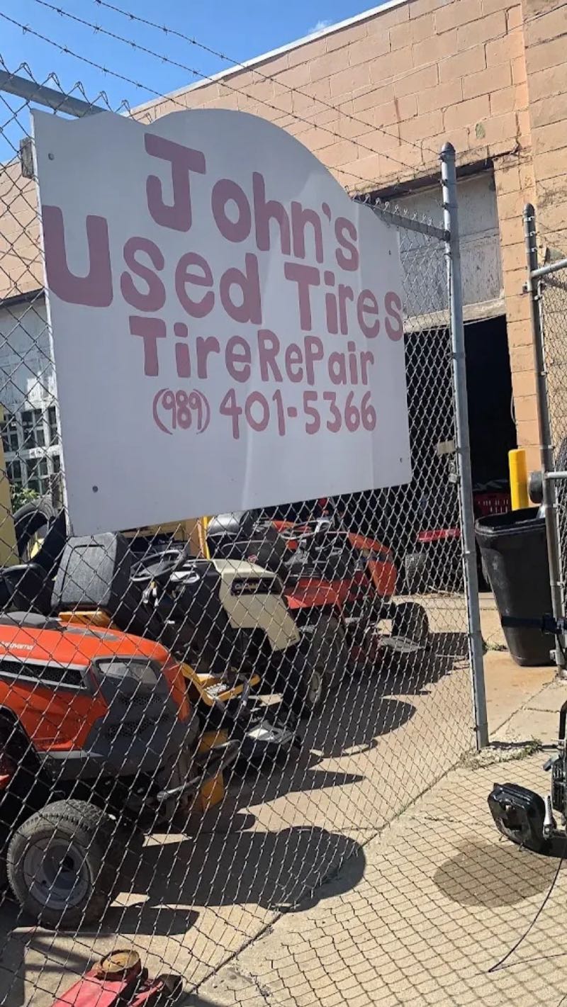 Storefront sign from the John's Used Tires website