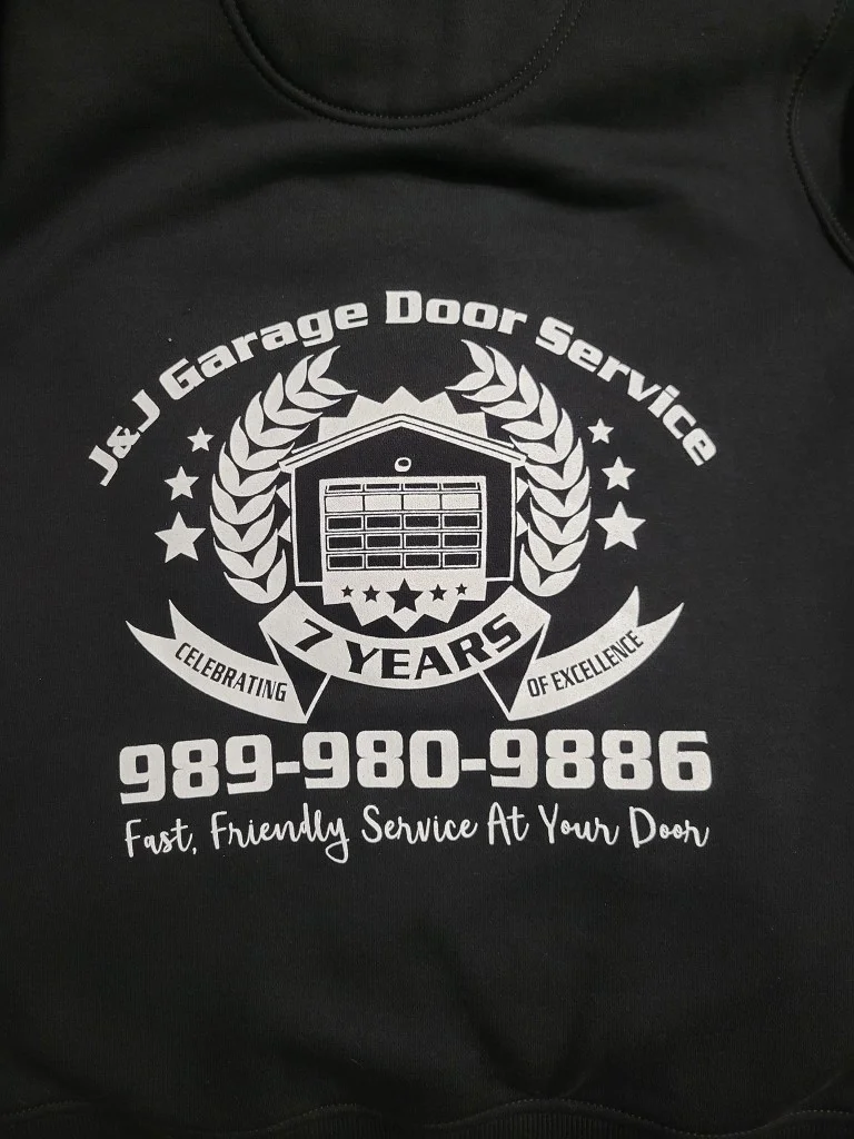 J & J Garage Door Service - 7 Years of Excellence logo on hoodie